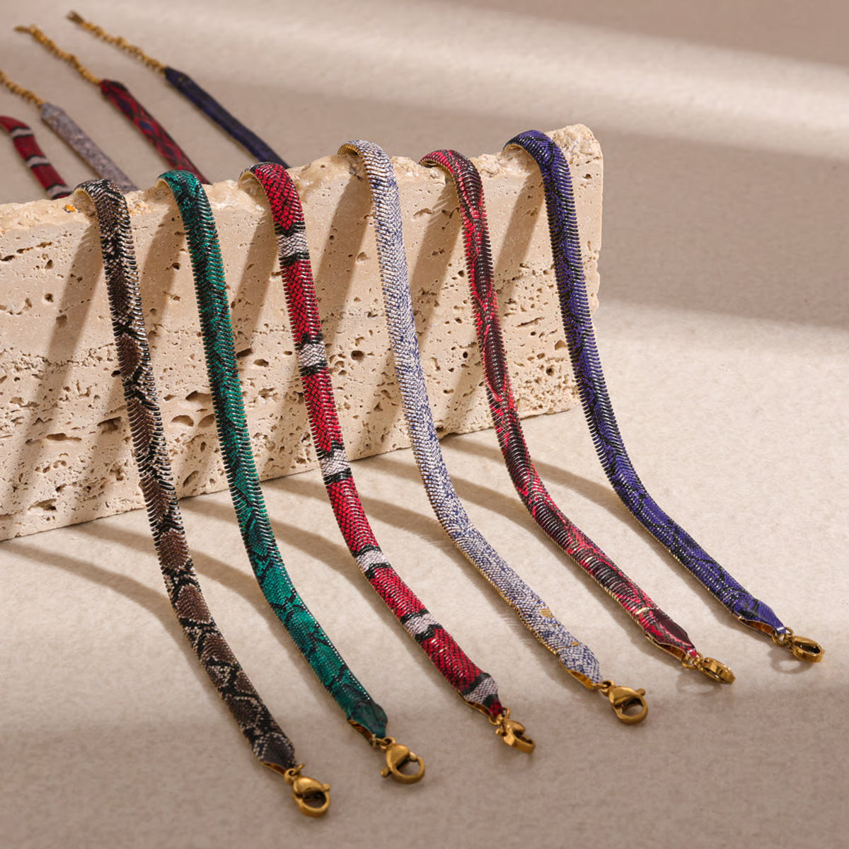 All six SnakeChain snake print necklace colors